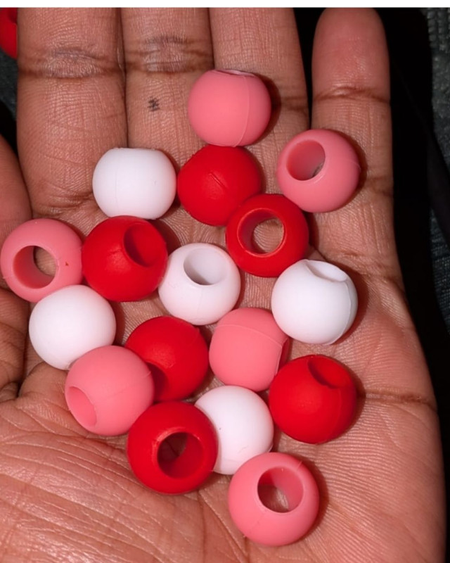 Red, baby pink and white beads.